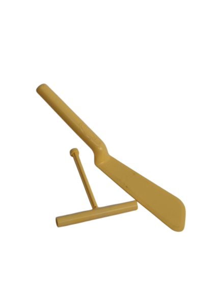 Crepe scraper, plastic, on a card