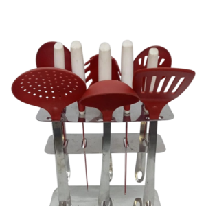 Tefal 12-piece serving set with knife on a stainless steel stand