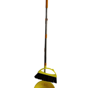 A shovel with a brush, a long handle, a chick