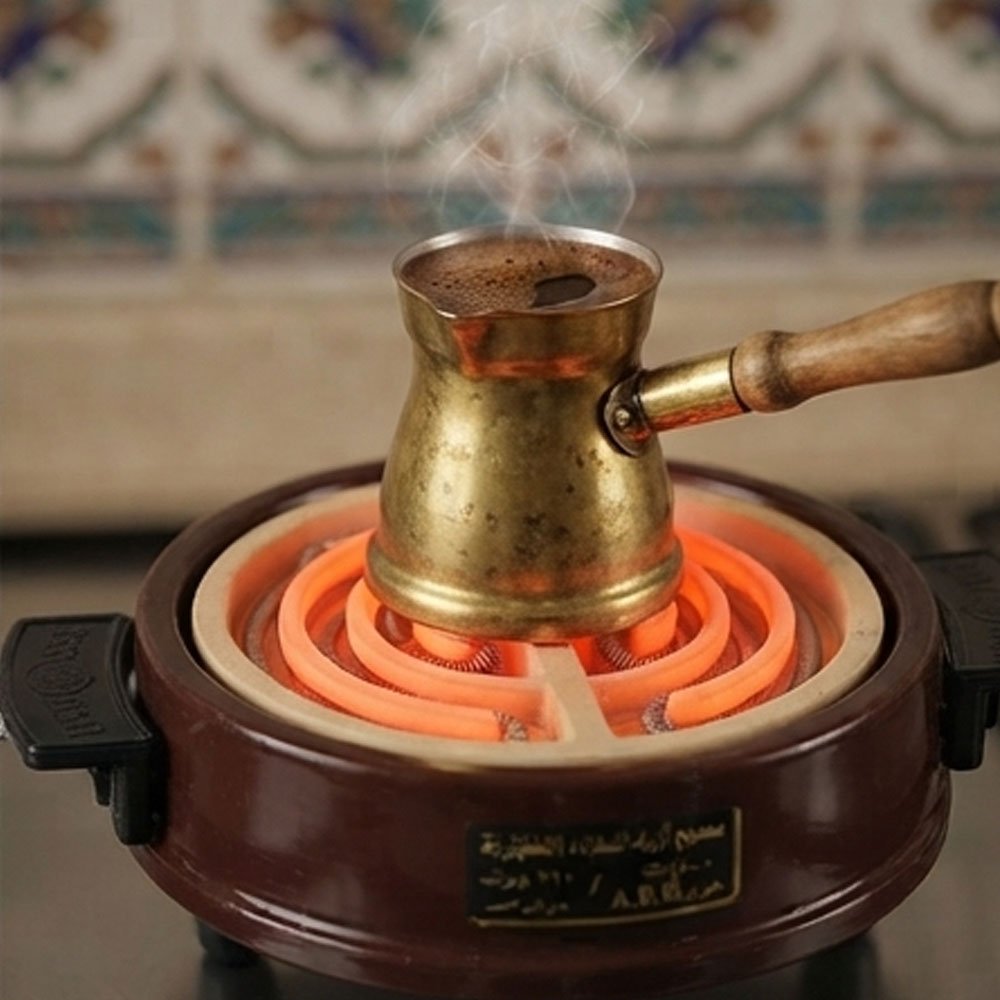 A circular spiral electric heater for lighting charcoal and heating beverages. - Image 2