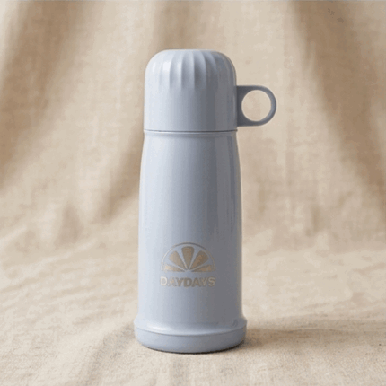 Thermos for storing hot and cold drinks with a cup lid