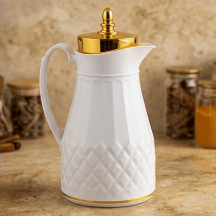 A luxurious thermal thermos for storing tea and coffee, in white with elegant gold accents.