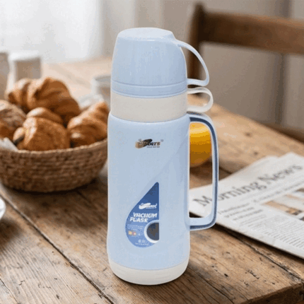 Thermal thermos for keeping liquids hot and cold, equipped with two serving cups.