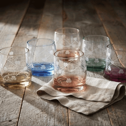 6-piece glass set for drinks and juices with colorful bases and a distinctive design