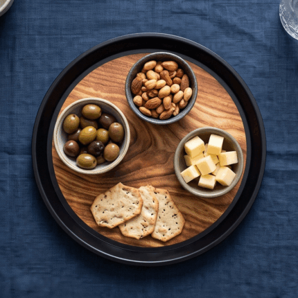 Modern round serving tray with an elegant wooden design and black frame, 30 cm