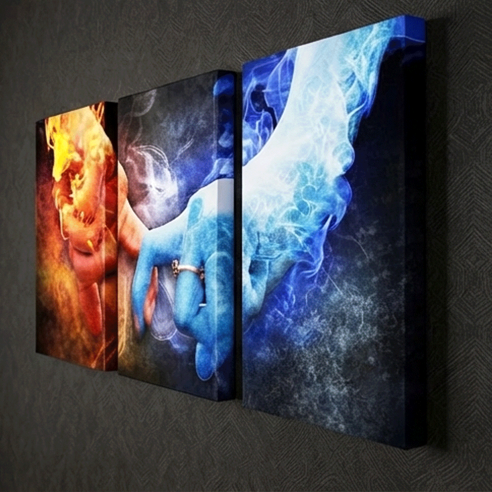 A modern, three-piece wooden artwork featuring a symbolic design of fire, water, and hands. - Image 2