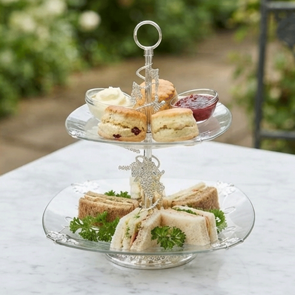 Two-tier glass cake and dessert stand with a stand and luxurious silver-colored metal details - Image 4